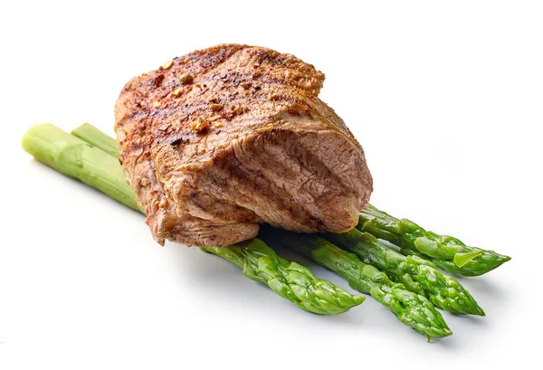 Freshly Grilled Pork Fillet Steak Steamed Asparagus Isolated White Background — Zdjęcie stockowe
