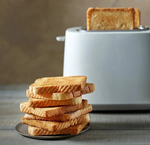Stack Toasted Bread Slices Defocused Toaster Kitchen Table — Stock Photo, Image