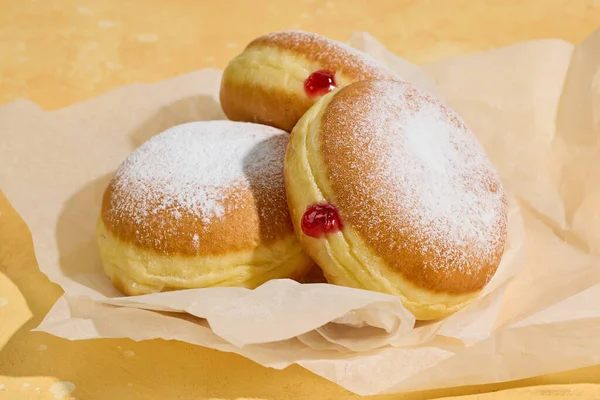 Freshly Baked Jelly Donuts Yellow Background — Stock Photo, Image