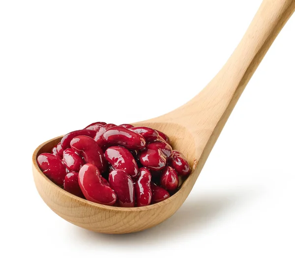 在白色背景上隔离的木制勺中的罐头红豆 — 图库照片