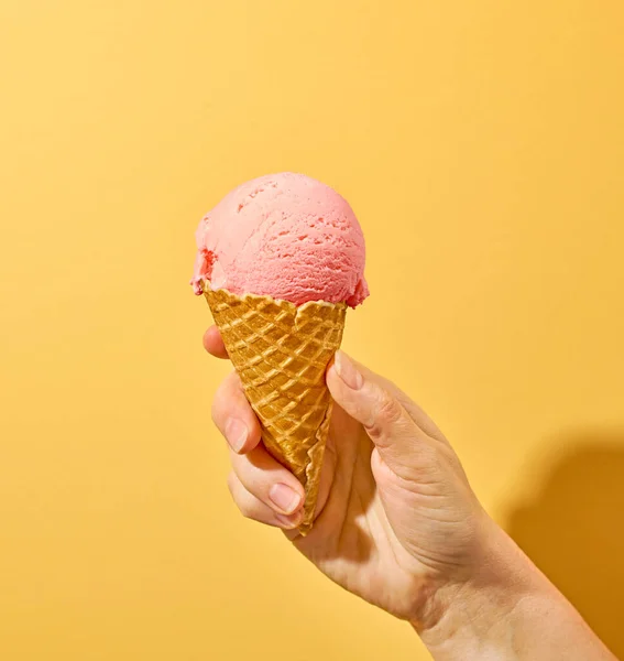Pink Ice Cream Human Hand Yellow Background — Stock Photo, Image