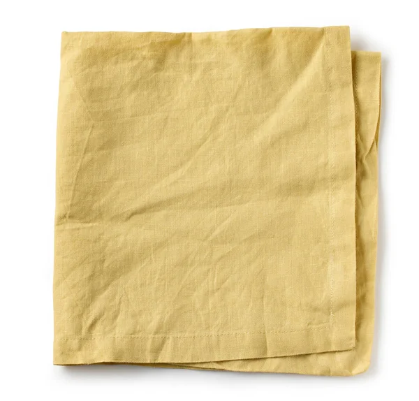 折叠的黄色棉质餐巾 白色背景 顶部视图 — 图库照片