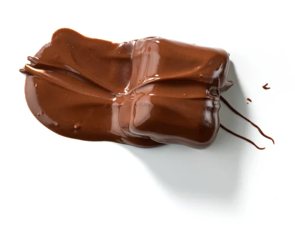 Stuk Gesmolten Chocolade Geïsoleerd Witte Achtergrond Bovenaanzicht — Stockfoto