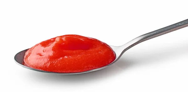 배경에 숟가락에 토마토 케첩을 끓인다 — 스톡 사진