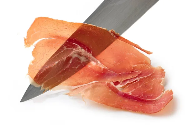 Sliced Spanish Iberico Ham Knife Isolated White Background — Stock Photo, Image