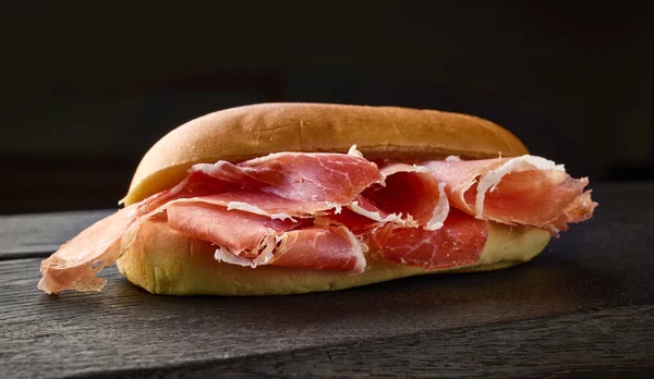 Sandwich Sliced Spanish Iberico Ham Black Wooden Board — Stock Photo, Image