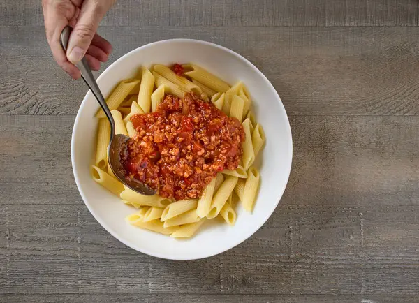 Bolognese Sauce Added Bowl Pasta Penne Top View — Stock Photo, Image