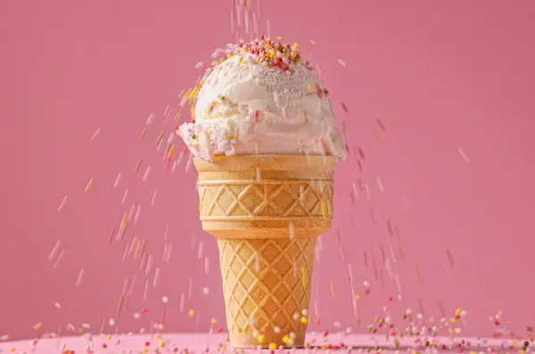 Vanilla Ice Cream Ball Waffle Cone Falling Sugar Sprinkles Pink — Stock Photo, Image