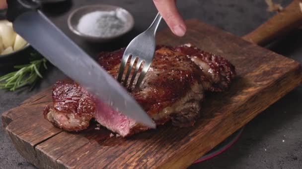 Chef Slicing Freshly Grilled Juicy Beef Steak Meat Knife Wooden — Stock Video