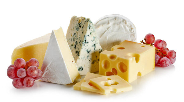 composition of different cheeses and red grape isolated on white background. delicious food collection closeup