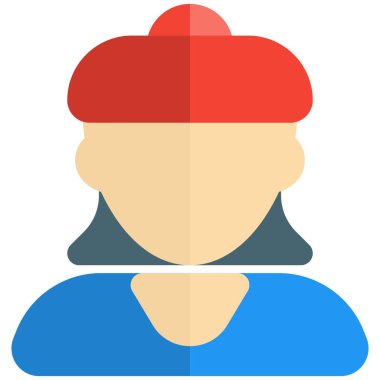 Kısa saçlı, bereli genç bir kadın.