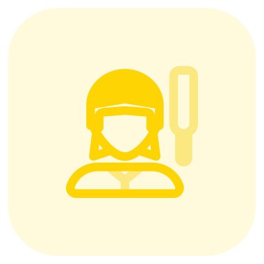 Kask takan kadın kriket oyuncusu.