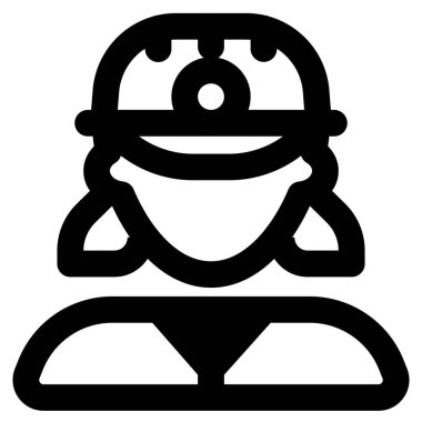 Başında lamba olan kasklı bir kadın madenci.