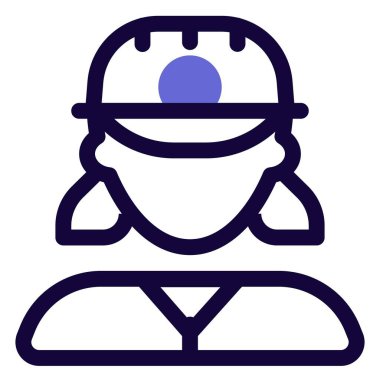 Başında lamba olan kasklı bir kadın madenci.