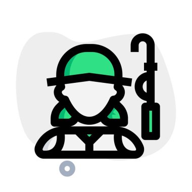 Olta kamışı takan balıkçı kadın.