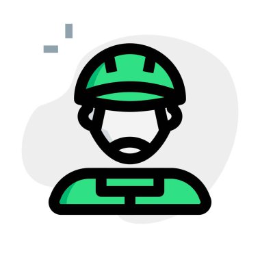 Koruyucu kask takan bir binici.