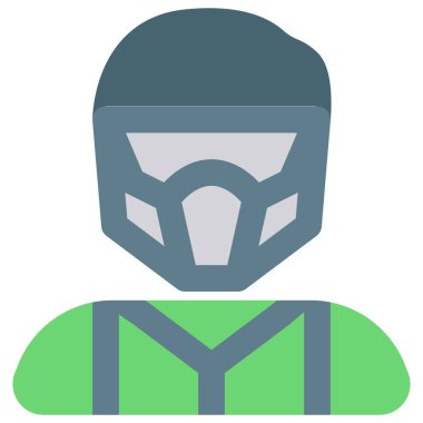 Paintball oyuncusu gözlük takıyor ve kask takıyor.