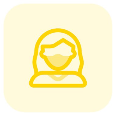 Emniyet önlemi olarak maske takan kız.