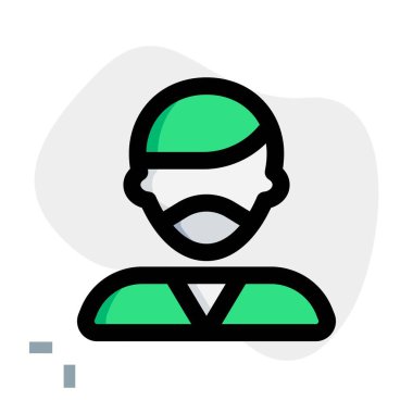 Maskeli adam saçlarını kestiriyor.