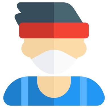 Tuhaf saçlı, saç bandı takan genç bir çocuk.