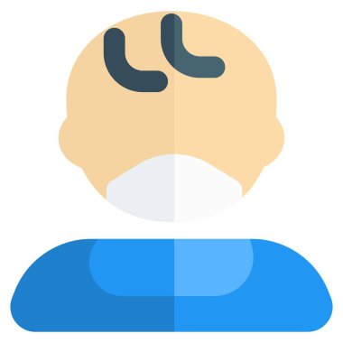 Yüz maskesi takan sevimli bir bebek..