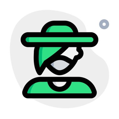 Plaj şapkası takan havalı bir kadın..