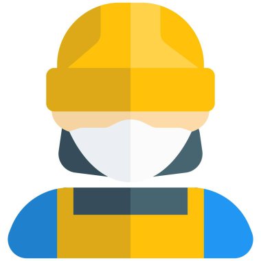 Önlem olarak maske ve miğfer takan kadın inşaatçı.