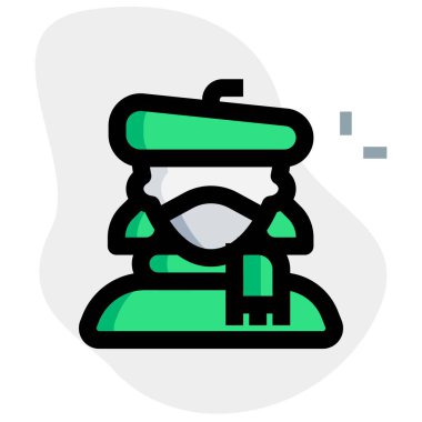 Egzoz ve maske taşıyan kadın ressam..