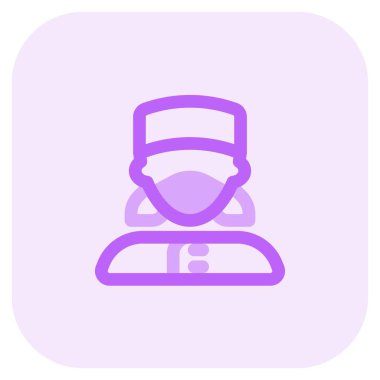 Otelde çalışan maskeli bir kadın kapıcı..