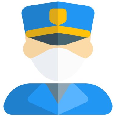 Maske takan haki üniformalı bir polis müfettişi..