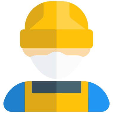 Başlıklı inşaat işçisi maske takıyor.