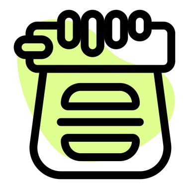 Hamburger paketini tutarken..