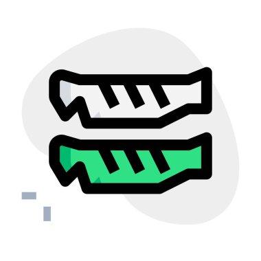 Grilled branzino stuffed with veggies.