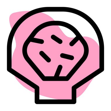 Oven baked scallops on the shell with parsley.