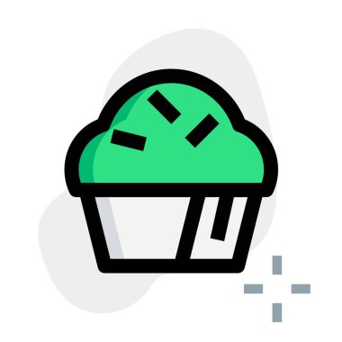 Delicious cupcake garnished with sprinkles