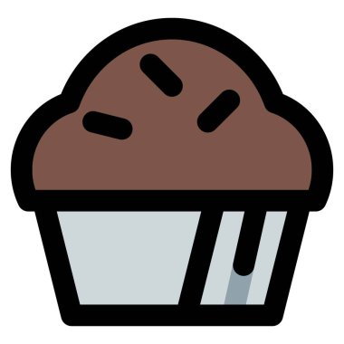 Sweet cupcake topped with flavored cream