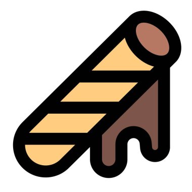 Melted chocolate dripping from crispy wafer tube