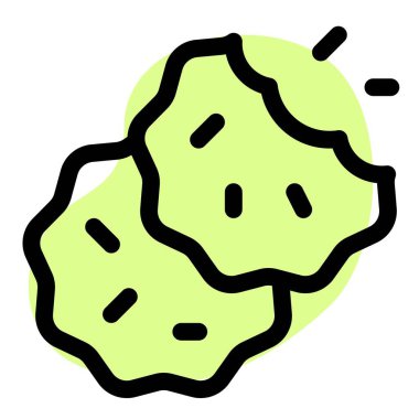 Tasty chocolate crumbs garnished on baked cookies