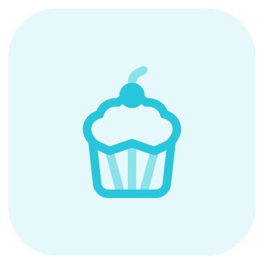 Baked muffin topped with whipped cream