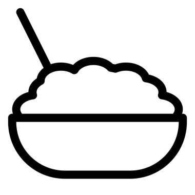 Cooked brown rice in bowl with spoon.