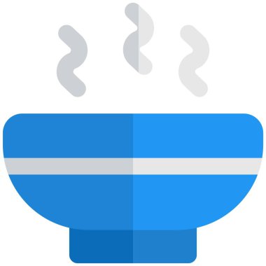 Hot soup served in ceramic bowl.