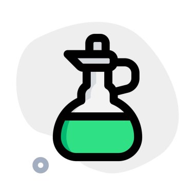 Handled jar containing apple cider vinegar.