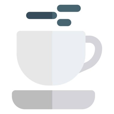 Cup of hot milk served with saucer.