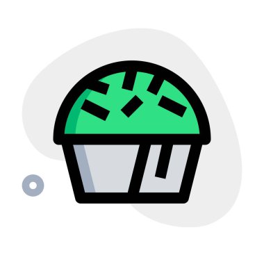 Freshly baked butter muffin sprinkled with rosemary.