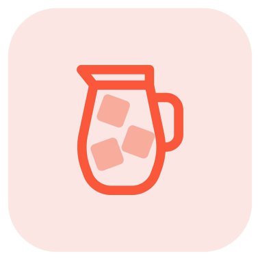 Cold milk with ice cubes in a jug.