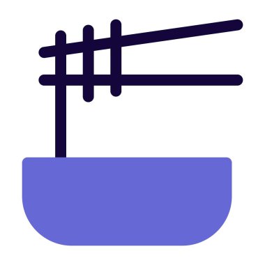 A bowl of spicy noodles ready to eat.