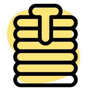 Poffertjes garnished with dripping butter.