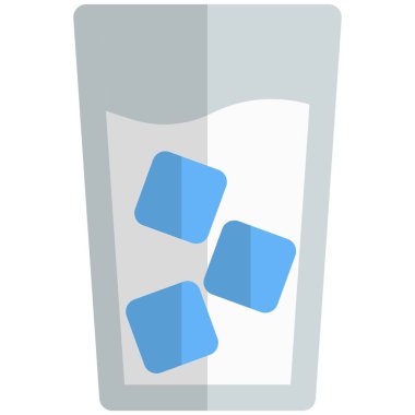 Ice cubes in a glass of cold milk