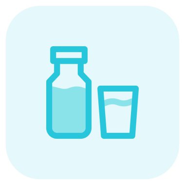 Fresh milk poured in glass and bottle