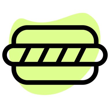 Garnished hot dog served as a side dish.